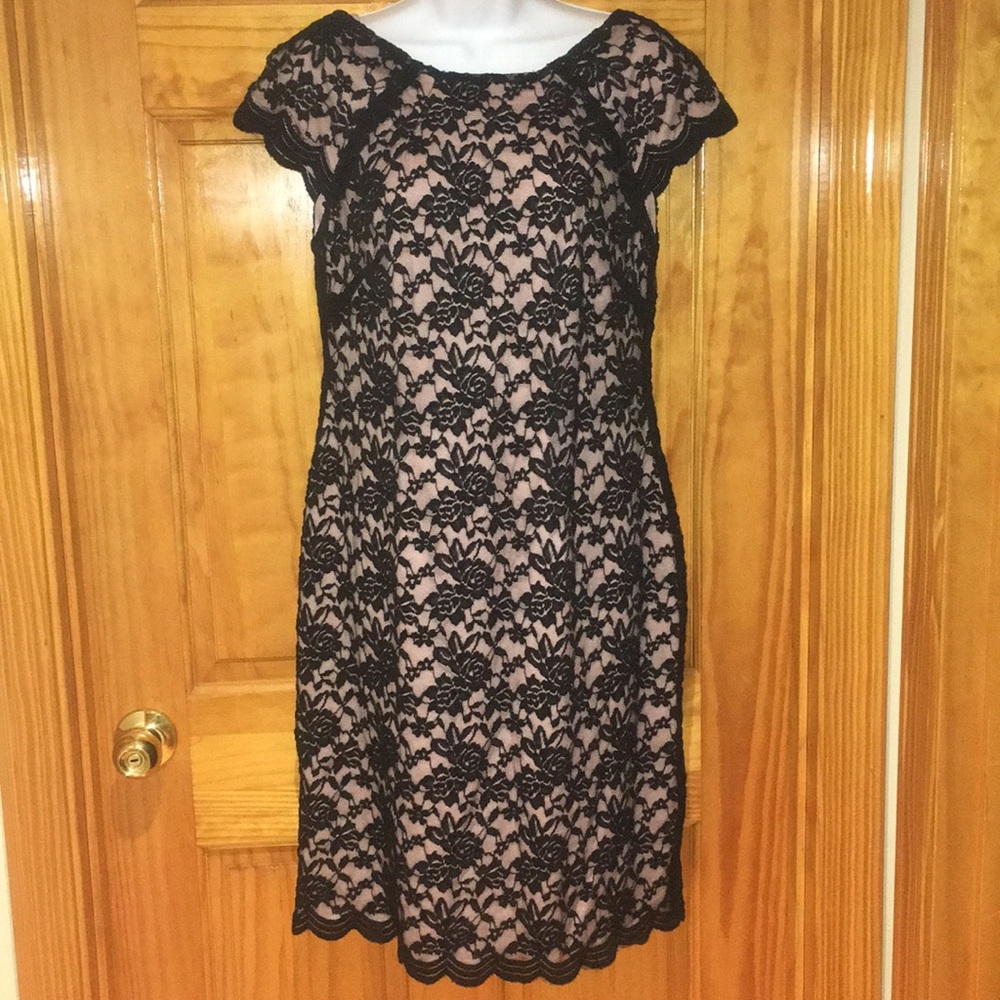 Woman’s black lace sheath dress
